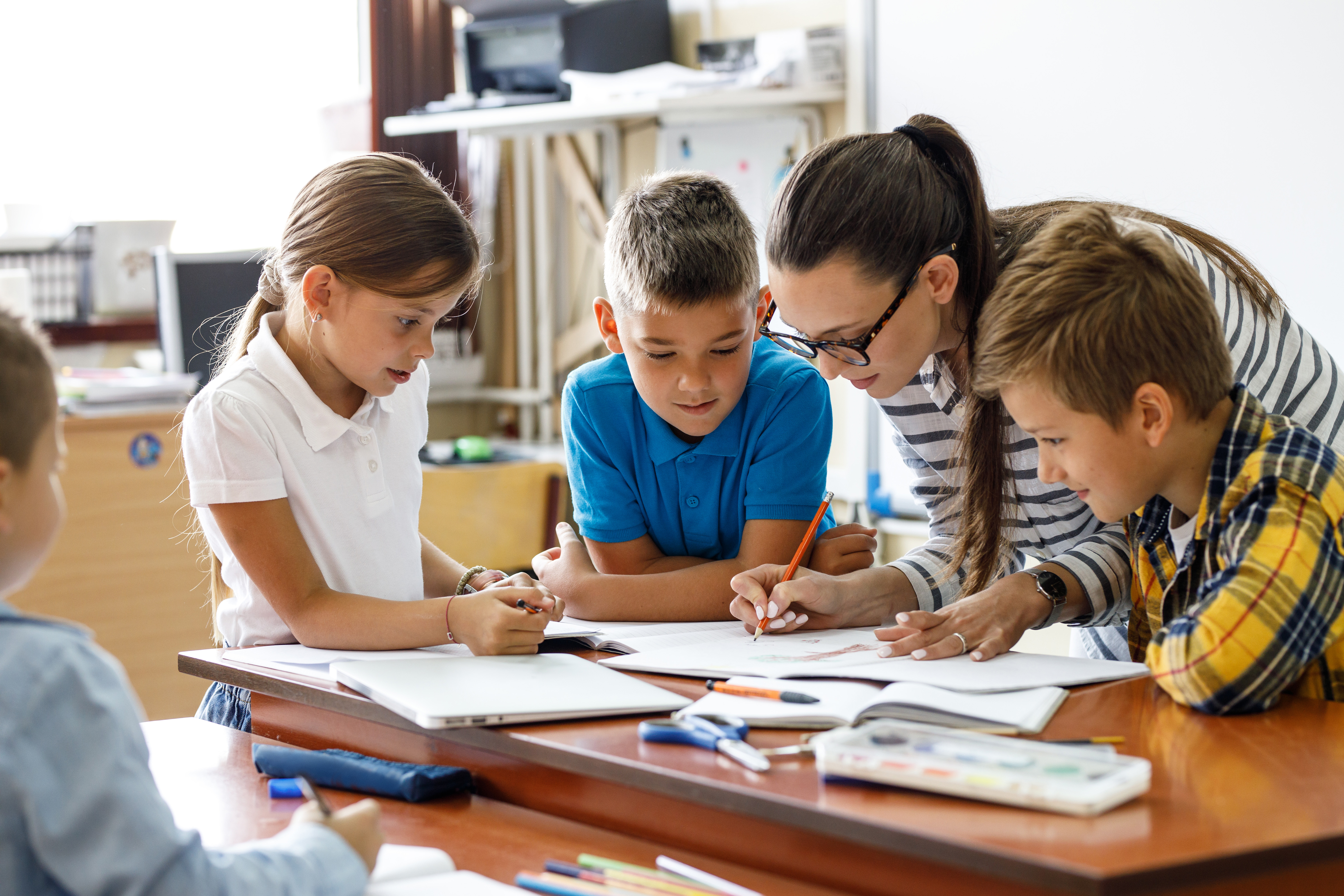 Elementary School Teacher with Students